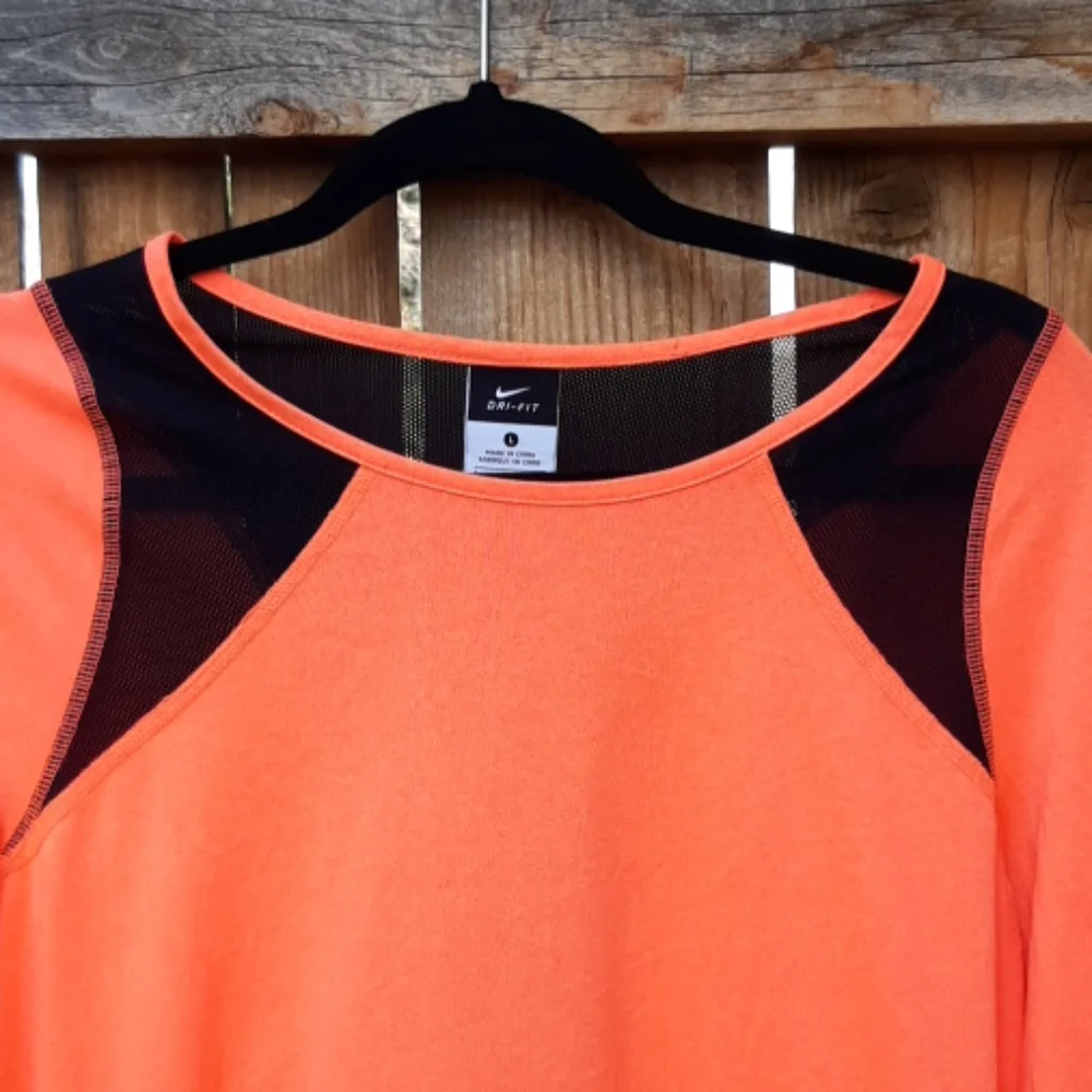 Nike long sleeve orange top w/ black mesh large